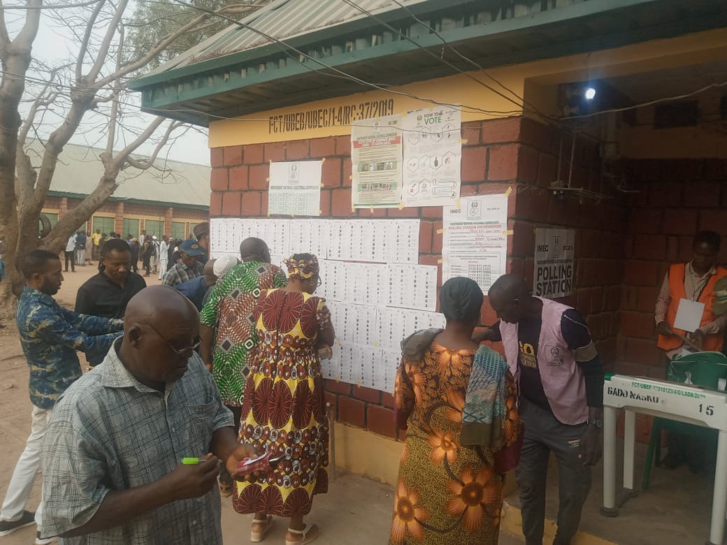 Voters check INEC register to confirm names, PUs in Abuja